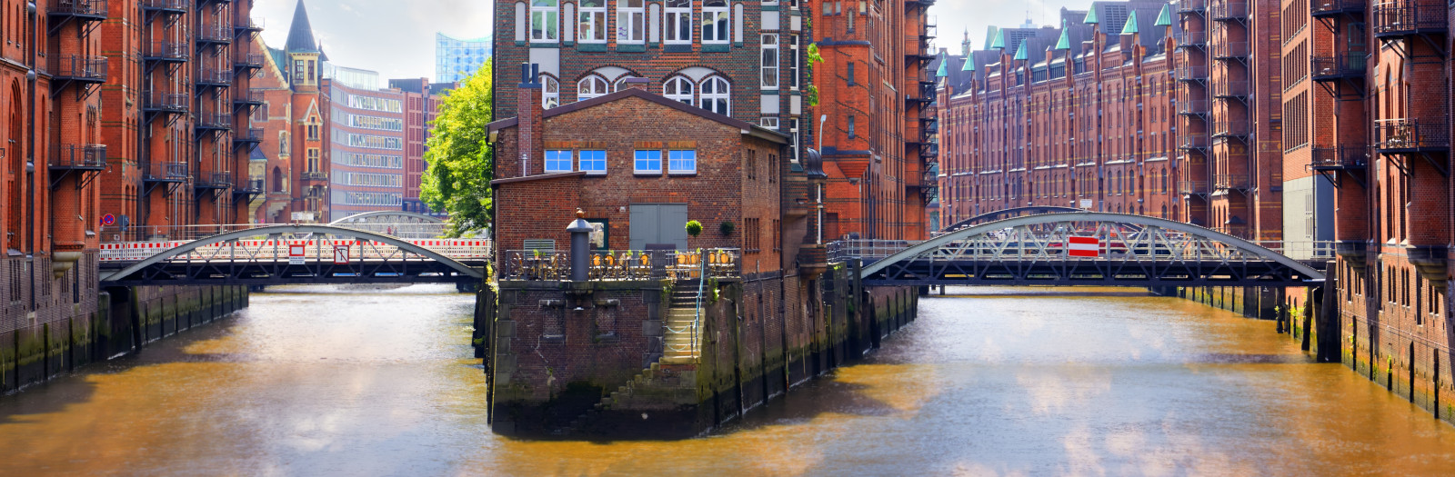 Buildings in the warehouse district, Hamburg, Germany beside canals